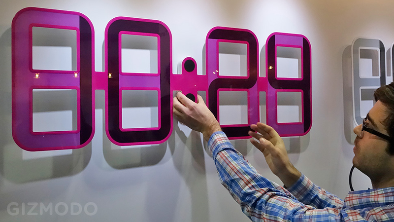 Illustration for article titled A Giant e-Ink Digital Clock Powered By a Tiny Watch Battery